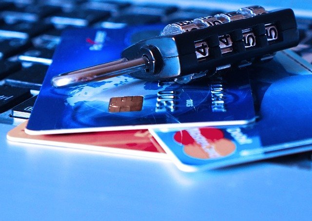 A few credit cards and a small combination lock. Merchants who have card-on-file and recurring payment information need to keep it current and secure.