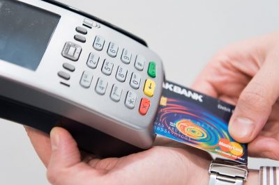 A credit card reader. Your payment services provider can provide you with a machine like this.